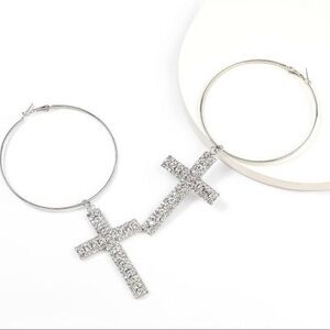 Cross hoop earrings. Large silver tone hoops with removable rhinestone cross.